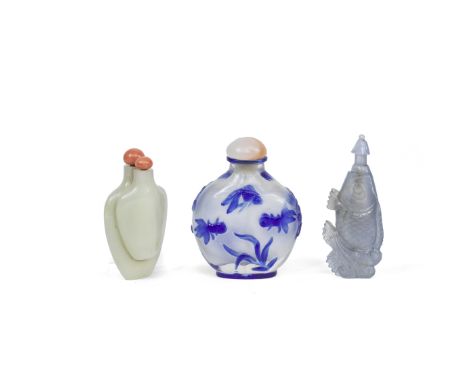 A GROUP OF THREE SNUFF BOTTLES19th centuryComprising: a double body pale green jade snuff bottle, with coral stoppers; a glas