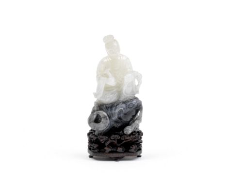 A WHITE AND GREY JADE 'LADY ON A CARP' GROUPLate Qing DynastyThe white jade lady holding a ruyi and seated on a grey jade fig