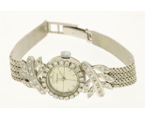 Jaeger-LeCoultre, witgouden damespolshorloge, rondom de wijzerplaat bezet met diamanten, gehalte 750/000, bruto gewicht 23.3 