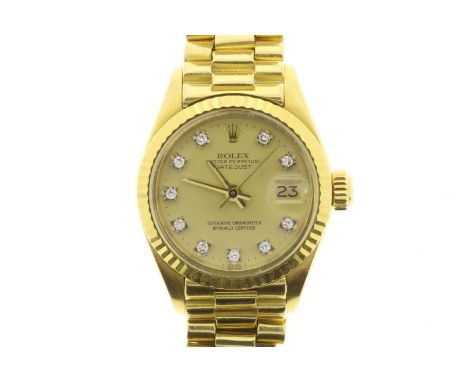 Geelgouden Rolex damespolshorloge, model Oyster Perpetual DATEJUST, 26 mm, geelgouden wijzerplaat voorzien van 10 briljantges