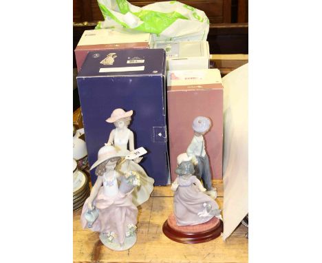 Two Lladro girl figures and two Nao figures, with boxes