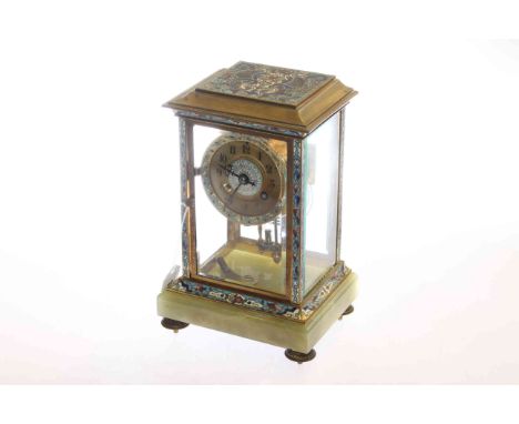 19th Century French brass, onyx and champleve enamel four glass mantel clock with striking movement and mercury pendulum