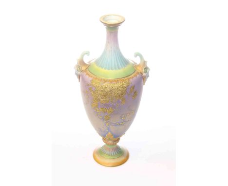 Royal Worcester urn vase with raised gilt decoration on blue ground and face mask handles