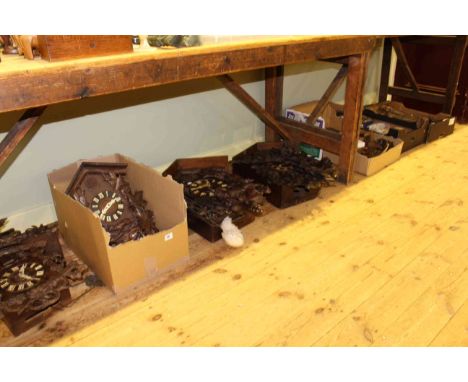 Collection of four large cuckoo clocks, parts, weights, barometer parts and collection of chisels