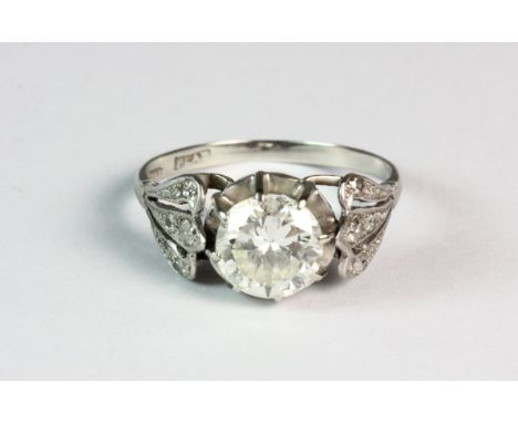 A vintage platinum and diamond (approx. 2ct spread) solitaire ring (O)