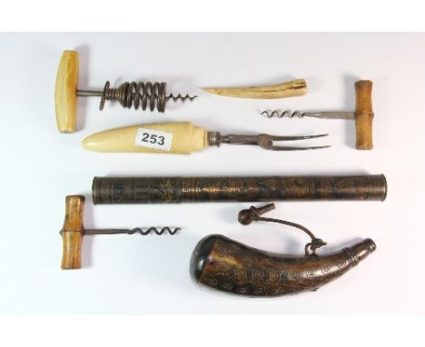 A collection of interesting small items including 3 corkscrews, an ivory handled carving fork, taper case and horn powder fla