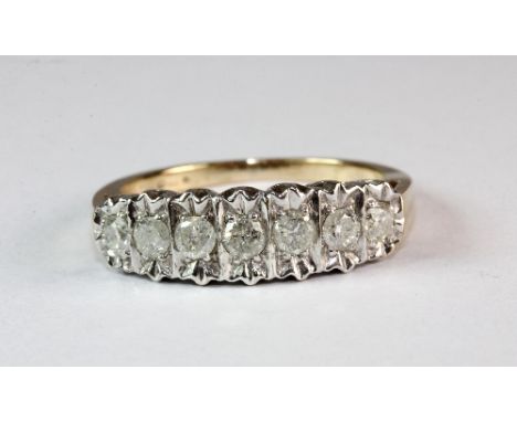 A 9ct yellow gold 7 stone diamond ring (M)