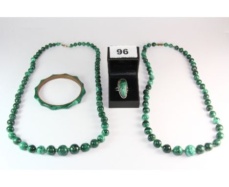 Two graduated malachite necklaces, a malachite and 930 silver ring and a malachite and copper bangle