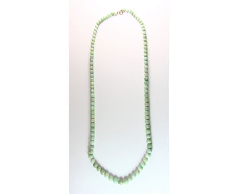 A 1930s / 1940s graduated jade necklace on a 9ct gold clasp