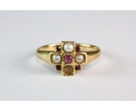 An 18ct yellow gold antique ruby and seed pearl ring (K) (1 seed pearl missing)