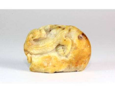 A small Chinese early 20th century pebble seal mounted with a young dragon H 3cm