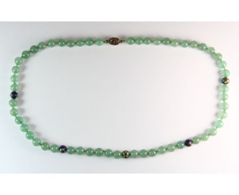 A single strand jade and cloisonné beaded necklace on a silver gilt clasp