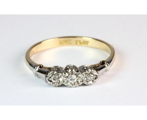 An 18ct gold and platinum 3 stone diamond ring (N.5)