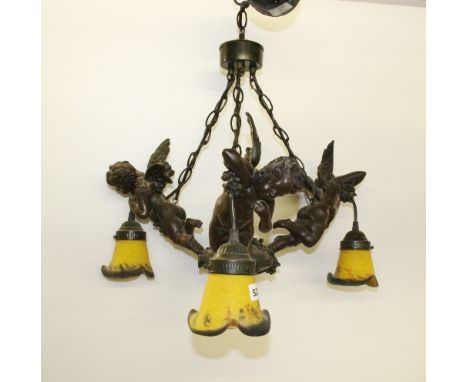 A 3 branch cherub centre light fitting