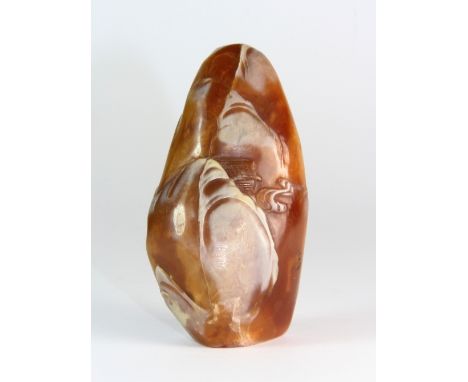 An interesting Chinese carved hardstone pebble seal representing a mountain landscape H 8.5cm