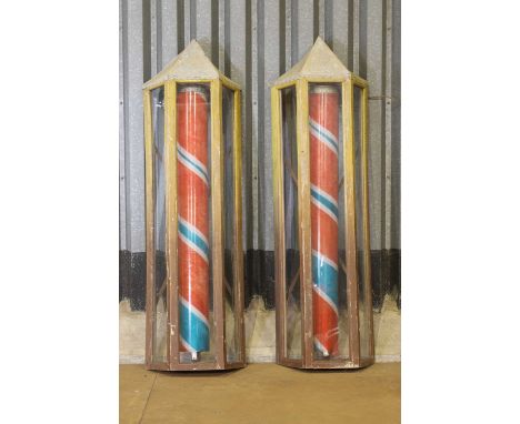 A pair of circus lights,c.1930s and later, French, each with a pagoda top and rotating LED tube light, 50cm wide23cm deep167c