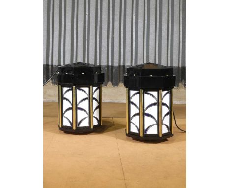 A pair of Art Deco cinema lights,c.1930s and later, each of faceted form with stained glass panels,60cm wide40cm deep40cm hig