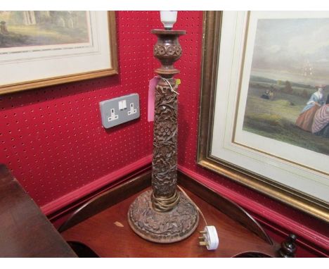 An Italian hardwood carved table lamp with leaf design, 74cm tall 