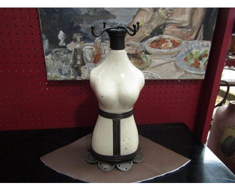 A ceramic mannequin form jewellery stand 