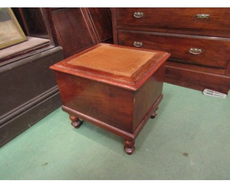 A commode stool with tooled leather insert on turned feet 