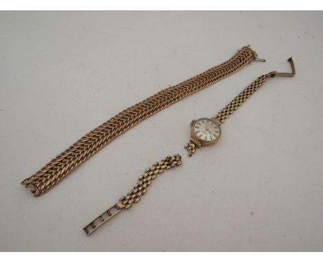 A 9ct gold bracelet (broken) 12.8 grams and a 9ct gold lady's Rotary watch 