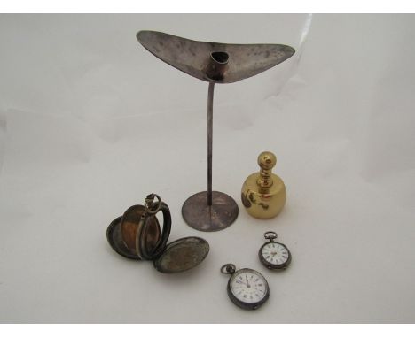 A candlestick, brass paperweight, two fob watches including 0.935 and pocket watch case (5) 