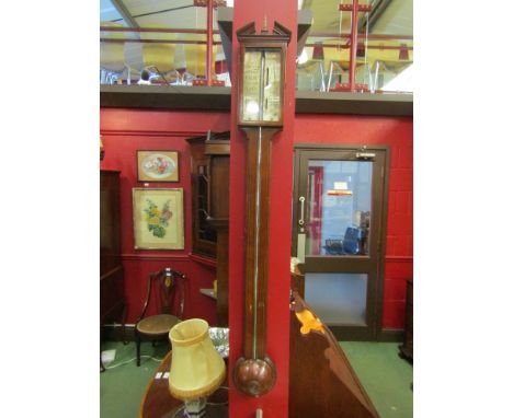 An inlaid mahogany stick barometer by Norwich maker. Indistinctly signed. a/f 