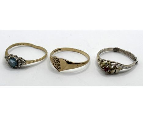 A 9ct gold signet ring, ring size P, 1.2 g, a white and blue stone ring, and a silver ring (3)Condition not good, all three r