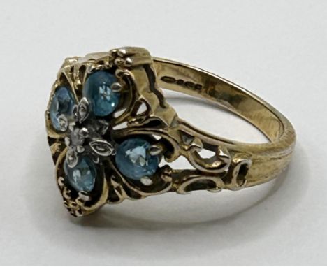 A 9ct gold, aquamarine and diamond cluster ring 