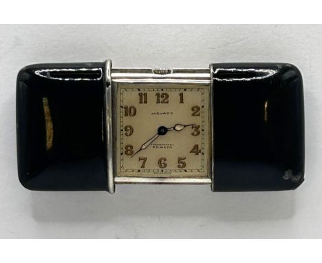 A silver Movado Ertmo purse watch, with black enamel decoration, the silvered dial with Arabic numeralsA few chips to the cas