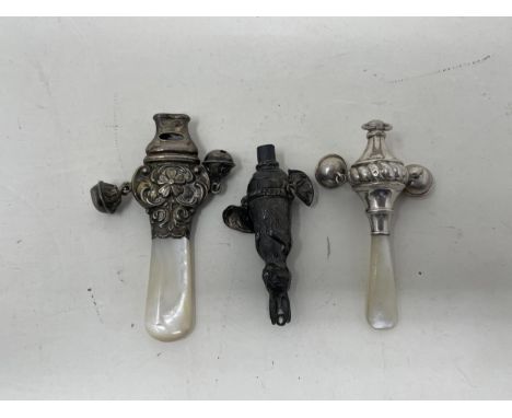 A silver and mother of pearl baby's rattle, another, and a silver rattle in the form of a hare (3) 