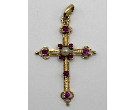 A late 19th/early 20th century gold, cultured pearl and red stone cross pendant 