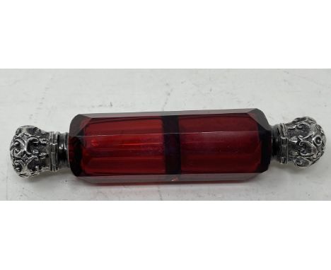 A Victorian ruby glass double ended scent bottle, with silver mounts 