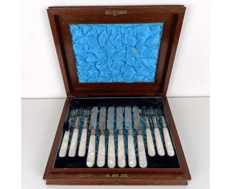 A set of Victorian silver dessert knives and forks, with mother of pearl handles, Sheffield 1880, in a mahogany case 