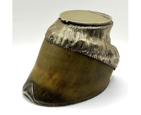 A novelty inkwell, made from a pony hoof 