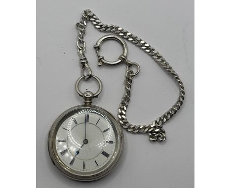 A late Victorian silver open face pocket watch, the enamel dial with Roman numerals, the dust cap with a presentation inscrip