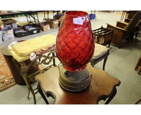 Large cranberry glass and brass lamp