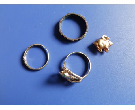 A Victorian black enamelled 9ct gold mourning ring - Chester , 1888, a 9ct gold serpent ring, one other and a '375' pig charm