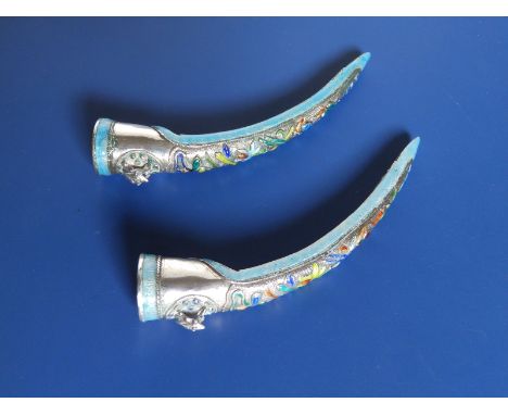 A pair of 19thC Chinese enamelled silver finger guards, each modelled with a small frog at the top, pale blue borders, 4.4".