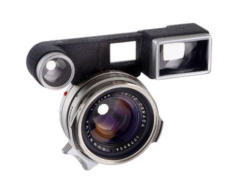 Summilux-M 1,4/35 mm für M3, um 1960 Leitz, Canada. Nr. 1778034, mit Suchervorsatz für die Leica M3 (Naheinstellung bis 65 cm