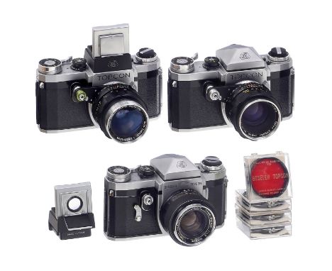 3 Topcon-Kameras, ab 1957Tokyo Kogaku, Japan. 24 x 36 mm SLR für Exakta-Bajonett. 1) Topcon R, Nr. 154192, mit Prismensucher,