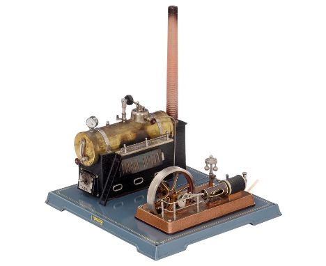 Liegende Dampfmaschine "Fleischmann Nr. 135/2", um 1960Gebrüder Fleischmann, Nürnberg. Liegender Messing­kessel, mit Wasserst