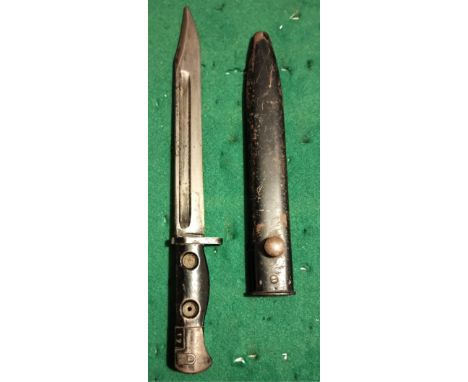 British L1A1 bayonet with conversion with ring fitting removed and  scabbard for the SLR L1A3 rifle, possibly converted into 