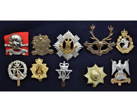 British EIIR Military Cap Badges (10) including: Royal Scots Dragoon Guards, The Royal Scots, Small Arms School, The Corps of