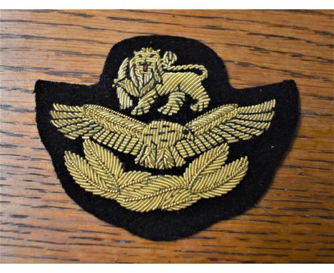 Rhodesian Air Force Pilot Officers Peaked Cap Cloth Patch, Gold Braid on black cloth. 