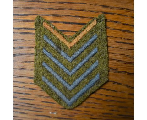 British Army Blue Overseas Service Stripes Chevron Cloth Patch, worn on the WWII Service Uniform four Blue and One Red. 