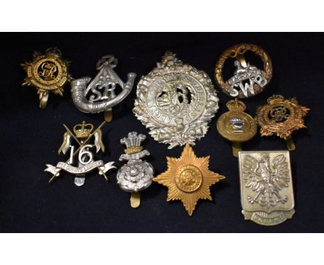 British Military Cap Badges (10) including: Irish Guards, RASC, South Wales Borderers, Scottish Rifles, Polish Army in Englan