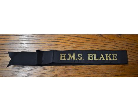 Post WWII H.M.S. BLAKE British Naval Cap Tally:- H.M.S. Blake was a light cruiser of the Tiger class of the British Royal Nav