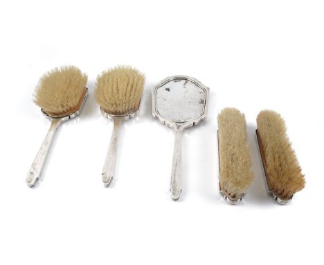 A LADY'S SILVER AND PINK ENAMEL MOUNTED FIVE PIECE DRESSING SET (5)Comprising; one hairbrush, Birmingham 1932, another hairbr