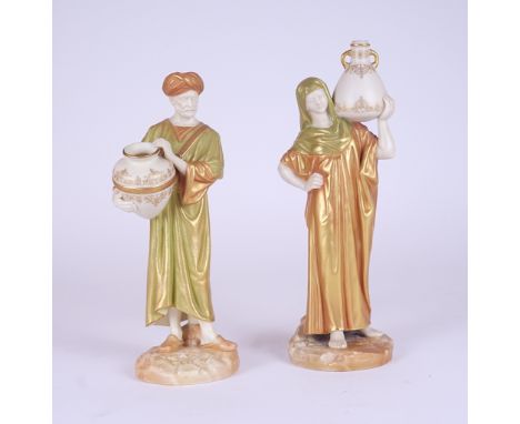 A PAIR OF ROYAL WORCESTER CAIRO WATER CARRIERS (2)Circa 1900Modelled by James Hadley, decorated in `shot enamels', green prin